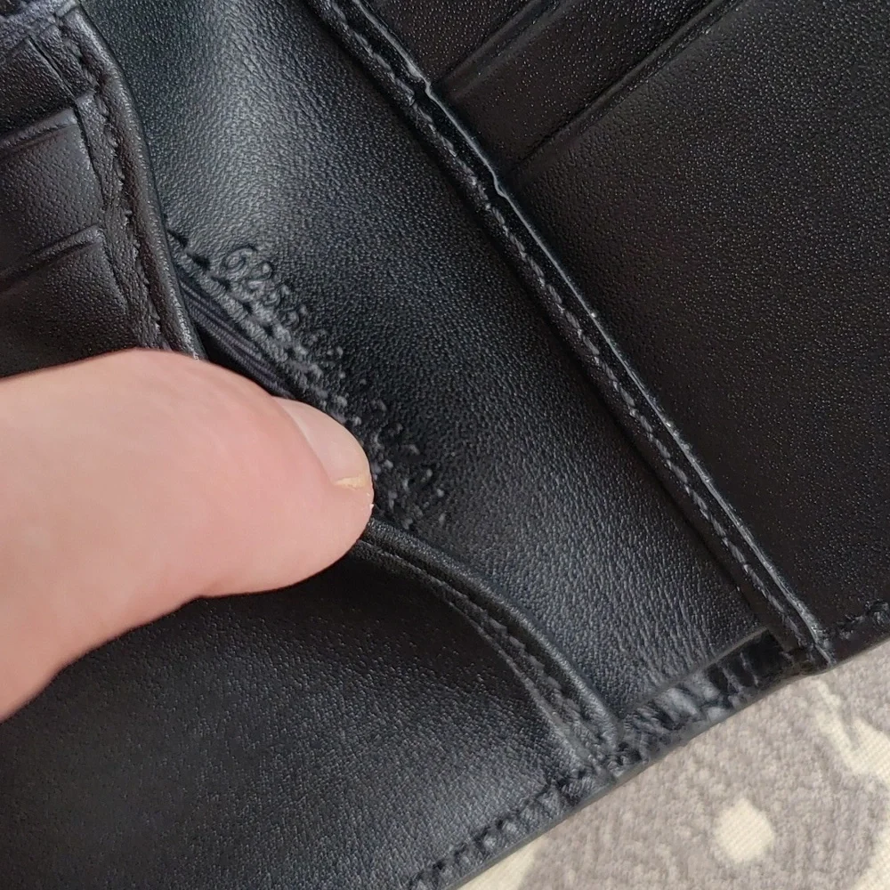 GUCCI GG EMBOSSED LEATHER MEN'S BIFOLD WALLET